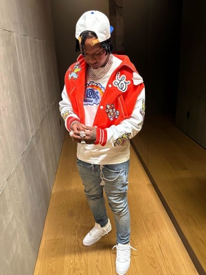 Moneybagg Yo At Rolling Loud In A Full Louis Vuitton Hat Jacket T Shirt And Sneakers Outfit