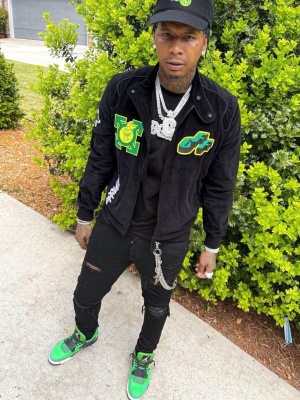 Moneybagg Yo Wearing A Black And Green Off White Jacket With Amiri Jeans And Green Jordans