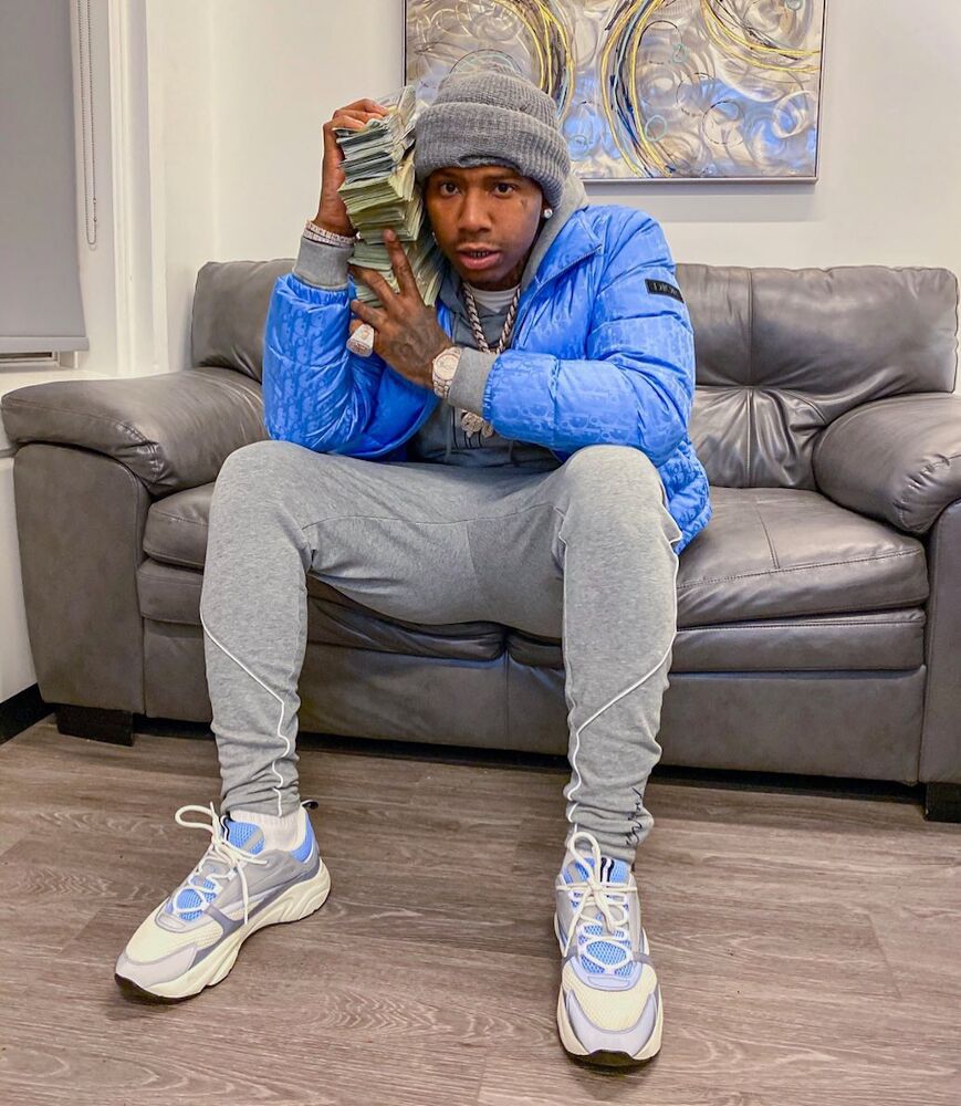 Moneybagg Yo Holds Up His Cash In a Dior Puffer Jacket & Sneakers