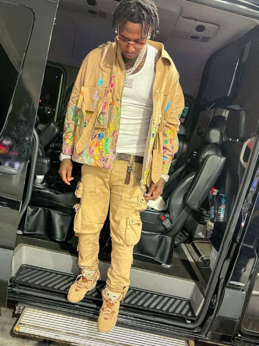 Moneybagg Yo Wearing a Beige Louis Vuitton, Amiri, & Jordan x Travis