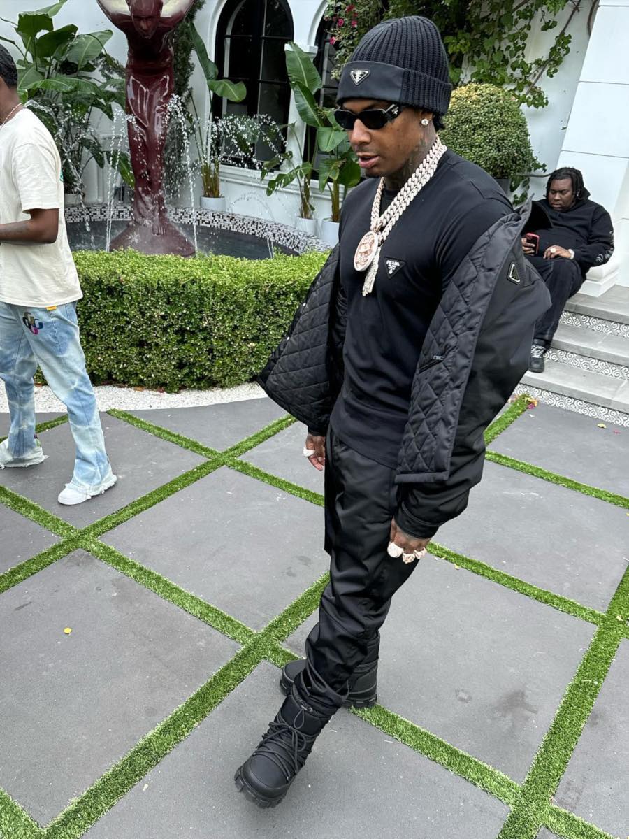 Moneybagg Yo: Prada Logo Beanie, Black Nylon Field Jacket & Black Snow Boots
