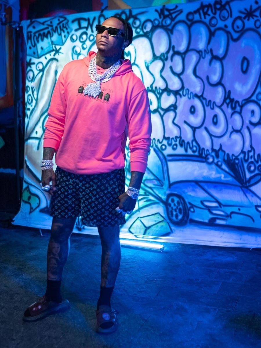 Moneybagg Yo Wearing a Moncler Hoodie With Louis Vuitton Mesh Shorts
