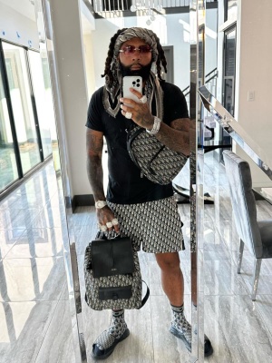 Moneyman Wearing A Dior Scarf And Shorts With Oblique Backpacks And Beige Slides