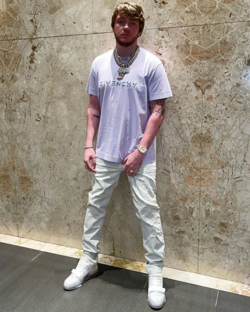 Murda Beatz Wearing a Givenchy Tee & Jeans With Louis Vuitton Sneakers