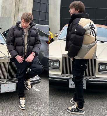 Murda Beatz Wearing A Moncler X Palm Angles Palm Tree Puffer With Black Cargo Pants And Nike X Travis Scott Sneakers