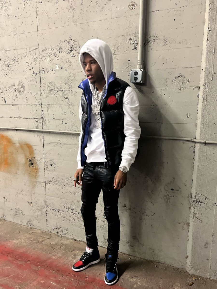 Nardo Wick Wearing a Moncler Vest With Black Denim & Mismatching Jordan 1s  | Incorporated Style