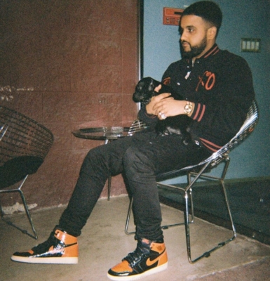 Nav With His Dog In Bape X Xo Jacket And Nike Shattered Backboard Sneakers