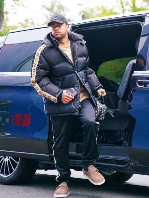 Neymar Wearing An Off White Hat With A Gucci Puffer Coat And Trackpants With A Dior Bag And Brown Suede Slippers