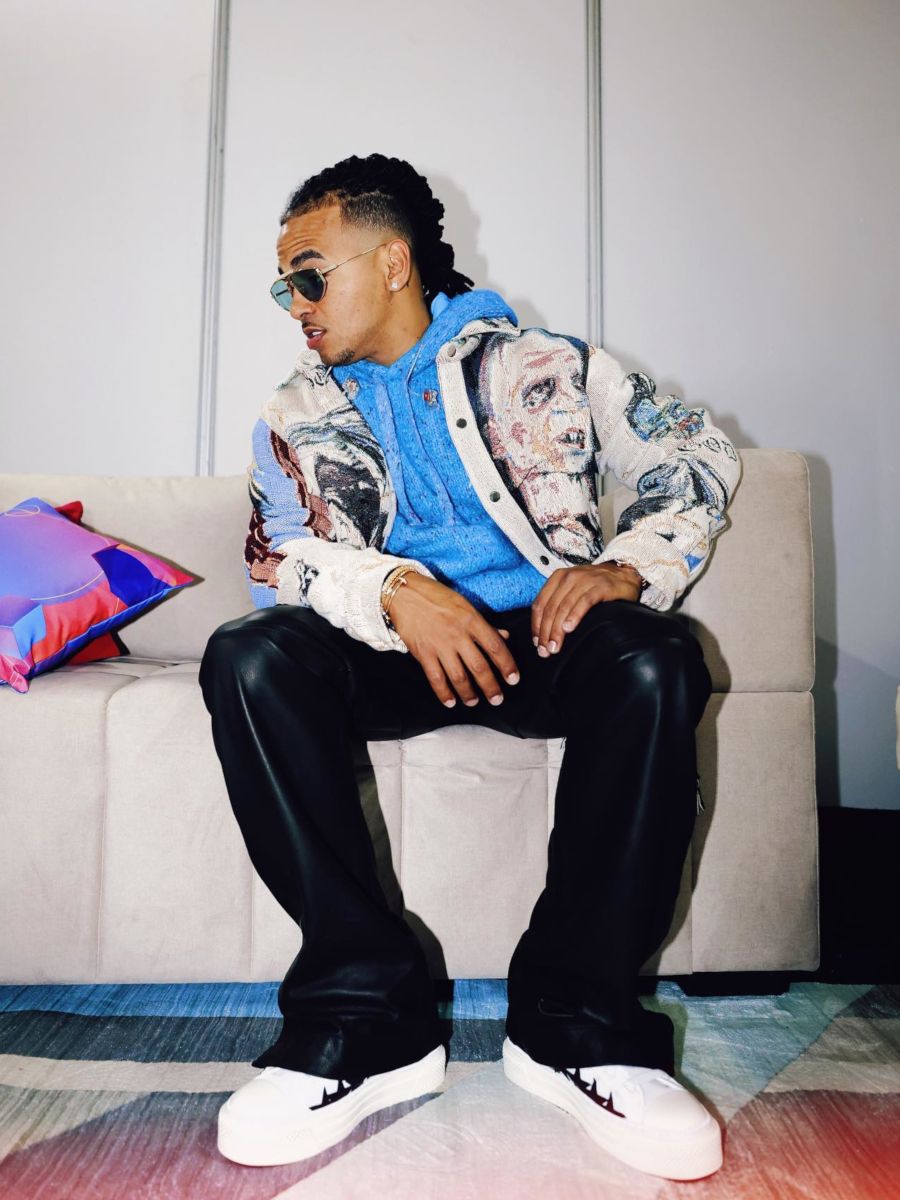 Ozuna Wearing an Amiri x Wes Lang Tapestry Shirt With Cargos & Star Sneakers