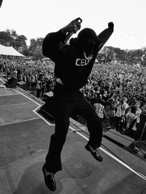 Peso Pluma Celine Logo Hat Black Mesh Hoodie Black Pants And Black Leather Shoes