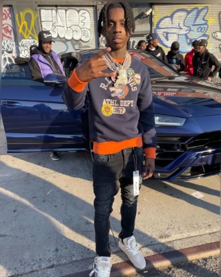 Polo G Wearing A Plo Ralph Lauren Sweatshirt With Off White White And Beige Sneakers