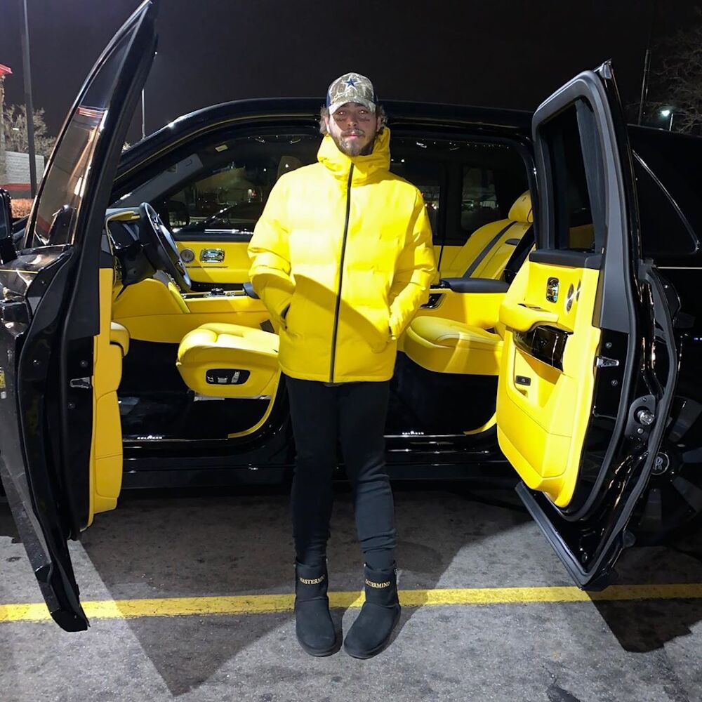 Post Malone Matches His Rolls In Huffer Puffer Jacket, Cowboys Camo Hat & Mastermind Uggs