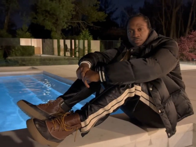 Pusha T Wearing A Moncler X Palm Angels Puffer Jacket Trackpants And Boots
