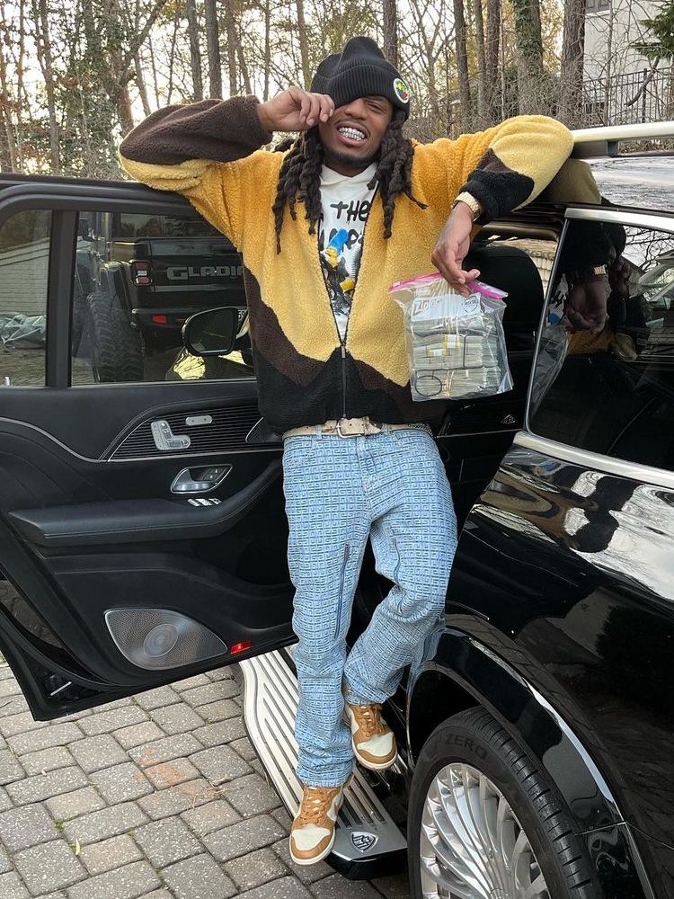 Quavo Wearing a Blue Sky Inn Fleece With Givenchy Jeans & Nike Dunks