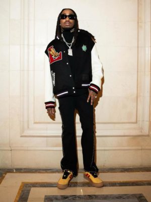 Quavo Wearing A Lanvin Future Varsity Jacket Black Stud Jeans And Yellow Sneakers