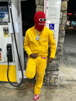 Real Boston Richey Wearing A Supreme Red Balaclava Supreme X Vanson Yellow Denim Jacket And Pants And Louis Vuitton Skate Sneakers