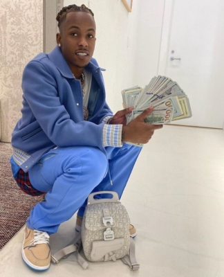 Rich The Kid Fans His Cash In Palm Angels Jacket Off White Track Pants And Khaki Nike Sneakers