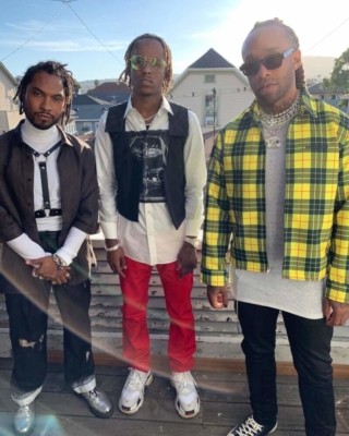 Rich The Kid In A Balenciaga Sneakers Red Pants An Alyx Vest Adn Whtie Shirt With Ty Dolla Sign In A Yellow Jacket
