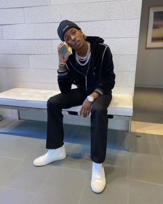 Rich The Kid Wearing A Celine Black Zip Hoodie And Beanie With White High Tops