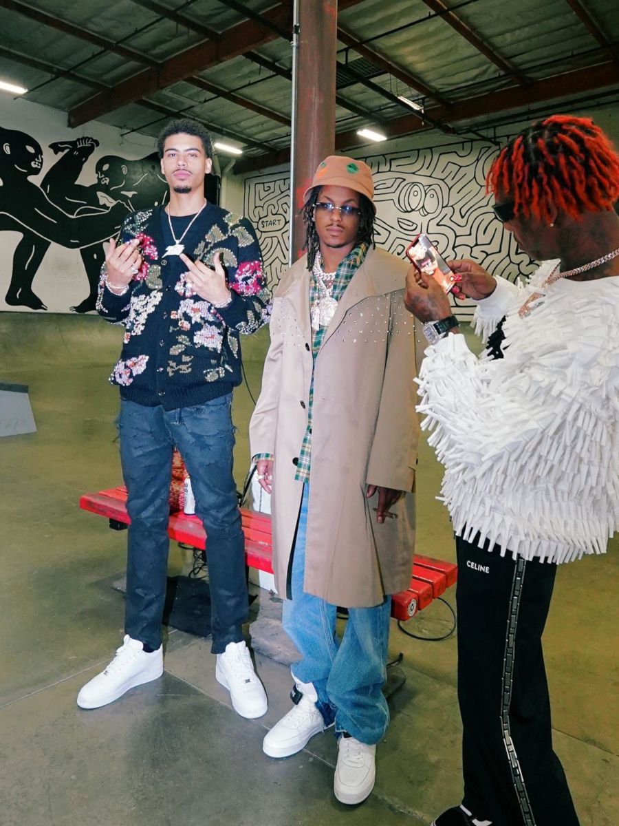 Rich The Kid Wearing a Full Celine Coat, Flannel, & Sneakers Outfit