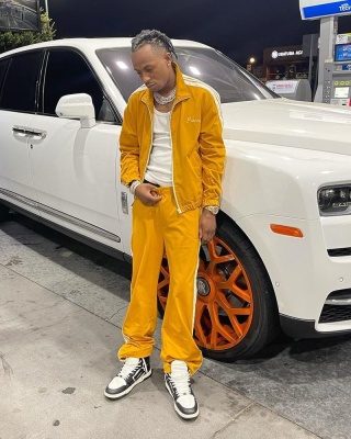 Rich The Kid Wearing A Marni Yellow Track Suit With Amiri Sneakers