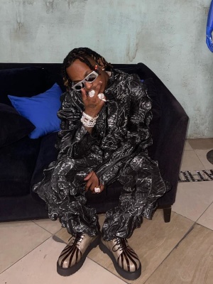Rich The Kid Wearing A Mjc Jacket And Pants With Balenciaga Sunglasses And Striped Shoes