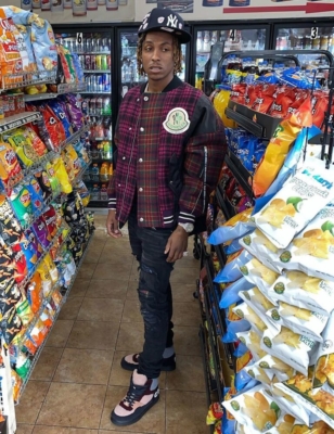 Rich The Kid Wearing A Moncler X Palm Angels Jacket With Nyy Hat And Chanel Sneakers
