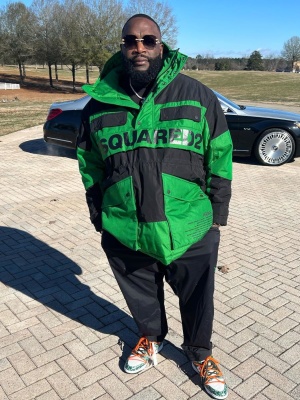 Rick Ross Wearing A Dsquared2 Green Parka And Y 3 Black Cargo Trackpants