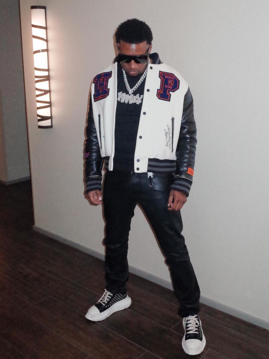 Rob49: Heron Preston Varsity Jacket, Leather Pants & Black Eyelet Sneakers