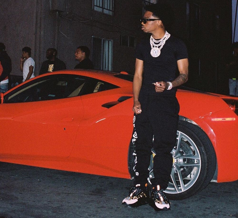 Roddy Ricch Leans On His 488 In LV Millionaires & Versace Sneakers | Incorporated Style