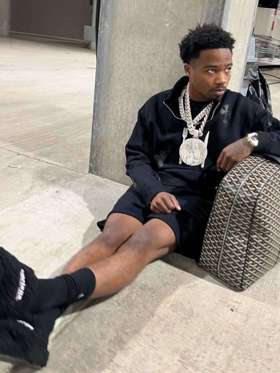 Roddy Ricch Relaxes With His Goyard Bag In a Chrome Hearts & Balenciaga Outfit