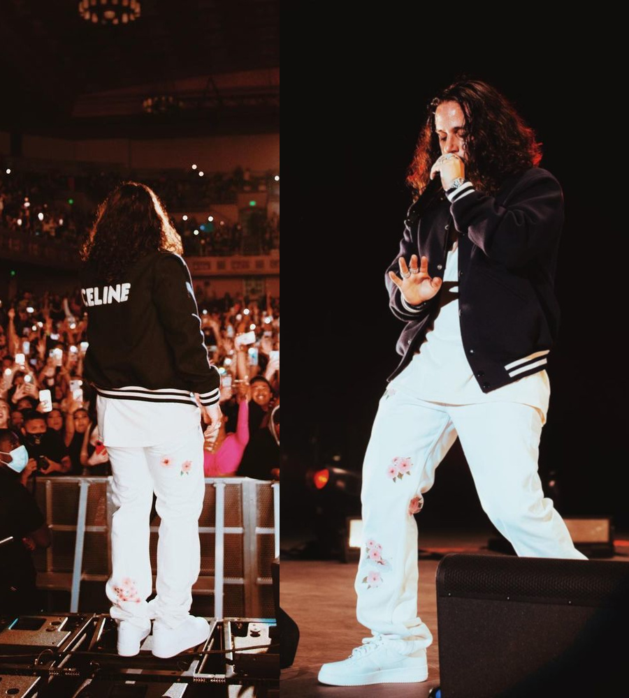 Russ Wearing a Celine Varsity Jacket With MOUTY Jeans & Nike AF1 Sneakers