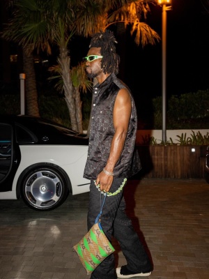 Saint Jhn Wearing Green Sunglasses With A Gucci Vest And Pants And Rick Owens Shearling Sneakers