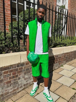 Santan Dave Wearing A Bottega Veneta Green Padded Vest And Shorts With Nike X Louis Vuitton Green Air Force 1s