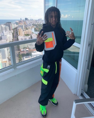 Swae Lee Wearing A Black Landlord Cybernetic Hoodie And Black Landlord Space Colony Trackpants With Versace Sneakers