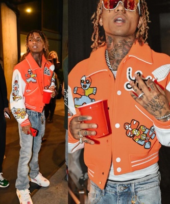 Swae Lee Wearing A Louis Vuitton Varsity Jacket With Flared Jeans And Louis Vuitton Sneakers