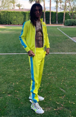 Swae Lee Wearing A Yellow Palm Angels Tracksuit With Blue Side Stripes