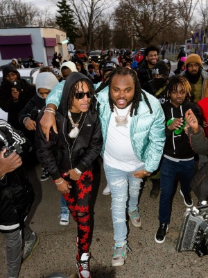 Tee Grizzley Wearing A Dior Oblique Puffer With A White Tee Amiri Crystal Jeans And Jordan X Union Sneakers