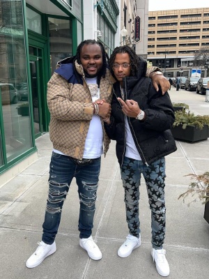 Tee Grizzley Wearing A Gucci Puffer Jacket With A Ysl Belt Bag Amiri Thrasher Jeans