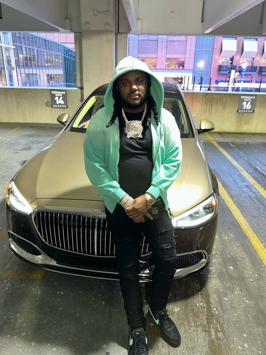 Tee Grizzley Sits Pistons Courtside In a Supreme x True Religion & Nike x Tiffany & Co Outfit