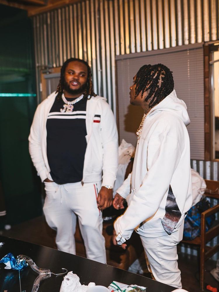 Tee Grizzley Wearing an White & Navy Moncler Outfit