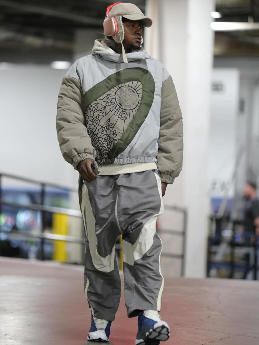 Terry Rozier: Grey Colorblock Puffer, Grey and White Trackpants & Jordan 13s