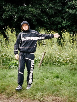 The Kid Laroi Wearing A Supreme Track Jacket And Trackpants With Nike Sneakers