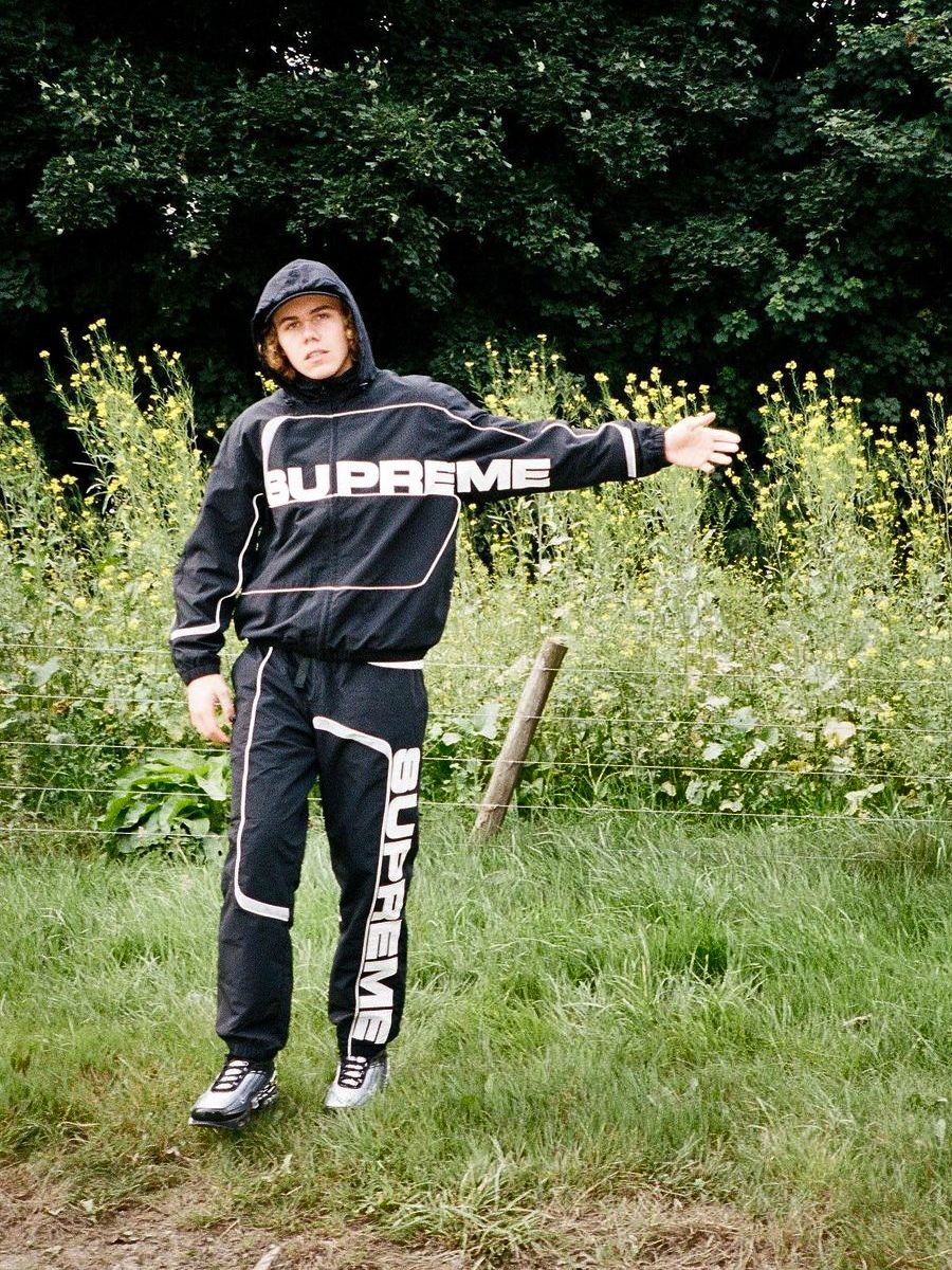 The Kid LAROI Wearing a Supreme Tracksuit With Matching Nike Sneakers