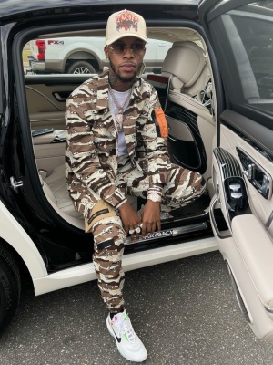 Toosii Wearing A Bape Camo Jacket And Cargo Pants With Nike X Off White Sneakers