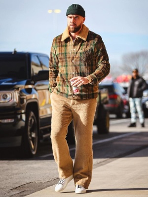 Travis Kelce Wearing A Green Beanie Elder Statesman Plaid Corduroy Jacket And Beige Mohair Pants