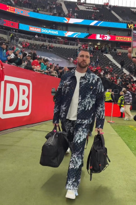 Travis Kelce Wearing A Louis Vuitton Denim Outfit With Nike Sneakers And A Bottega Bag