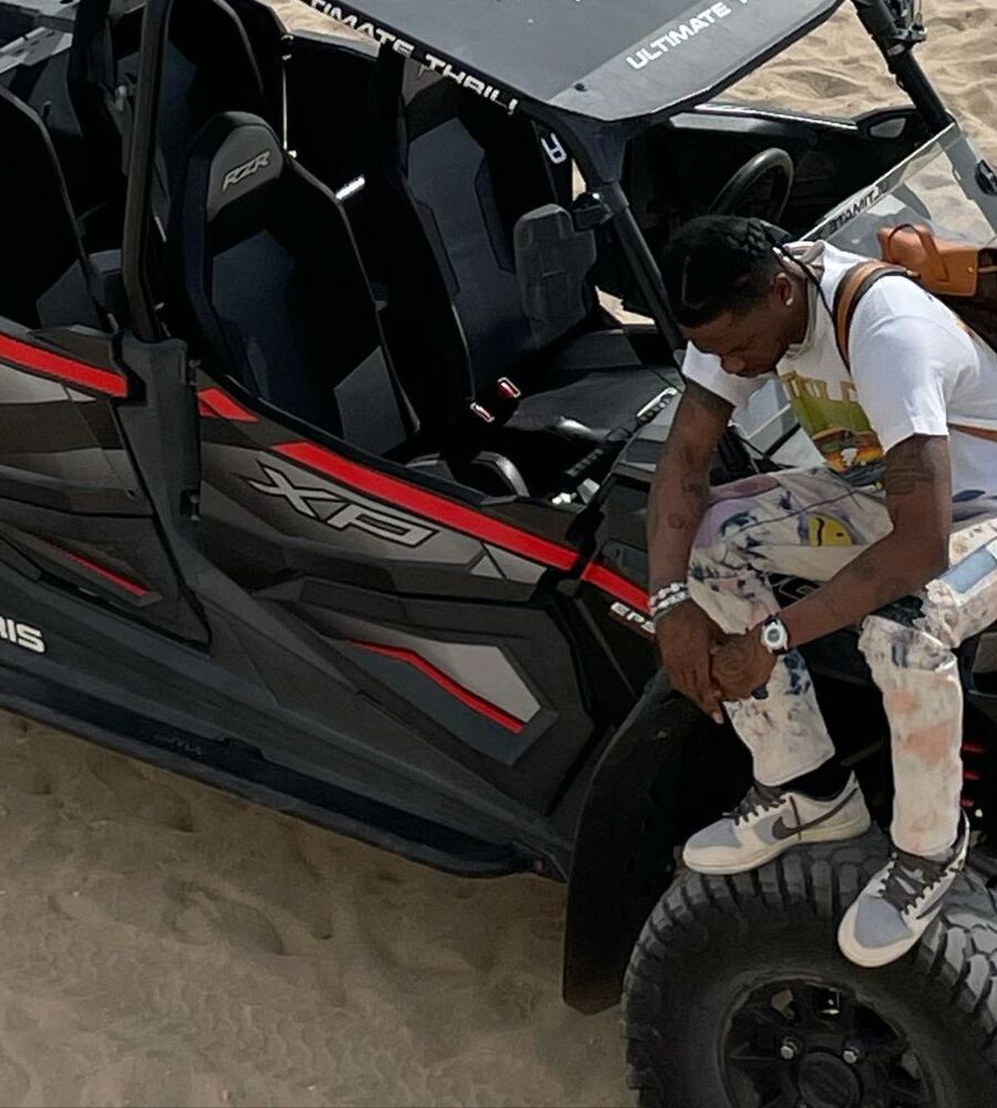 Travis Scott Wearing a LV Backpack With KAPITAL Jeans & PlayStation Dunks