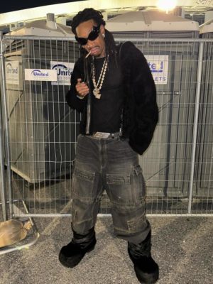 Wiz Khalifa Black Pointy Sunglasses Black Shearling Hooded Jacket Balenciaga Cargo Jeans Balenciaga Faux Fur Boots