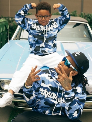 Wiz Khalifa Promotes New Camo Hoodie Merch With Oakley Sunglasses